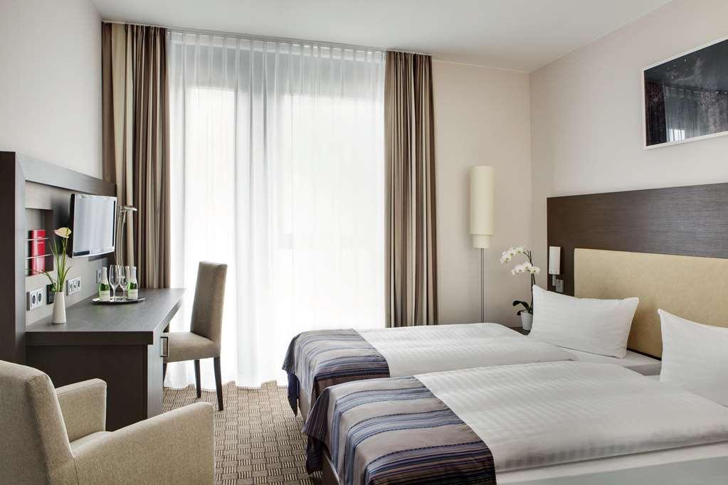 Intercityhotel Hamburg Dammtor-Messe Pokoj fotografie